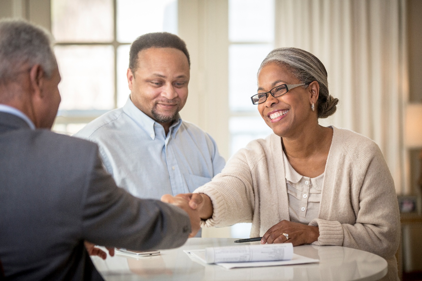 Couple talking to an adviser